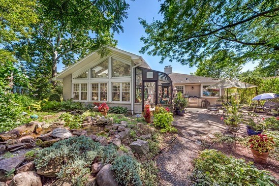 1850 Burton Lane Park Ridge, IL 60068 - Photo 6 of 34 a front view of a house with yard and green space