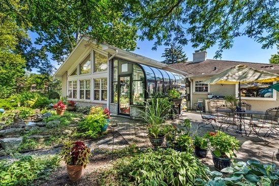 1850 Burton Lane Park Ridge, IL 60068 - Photo 7 of 34 a front view of a house with garden