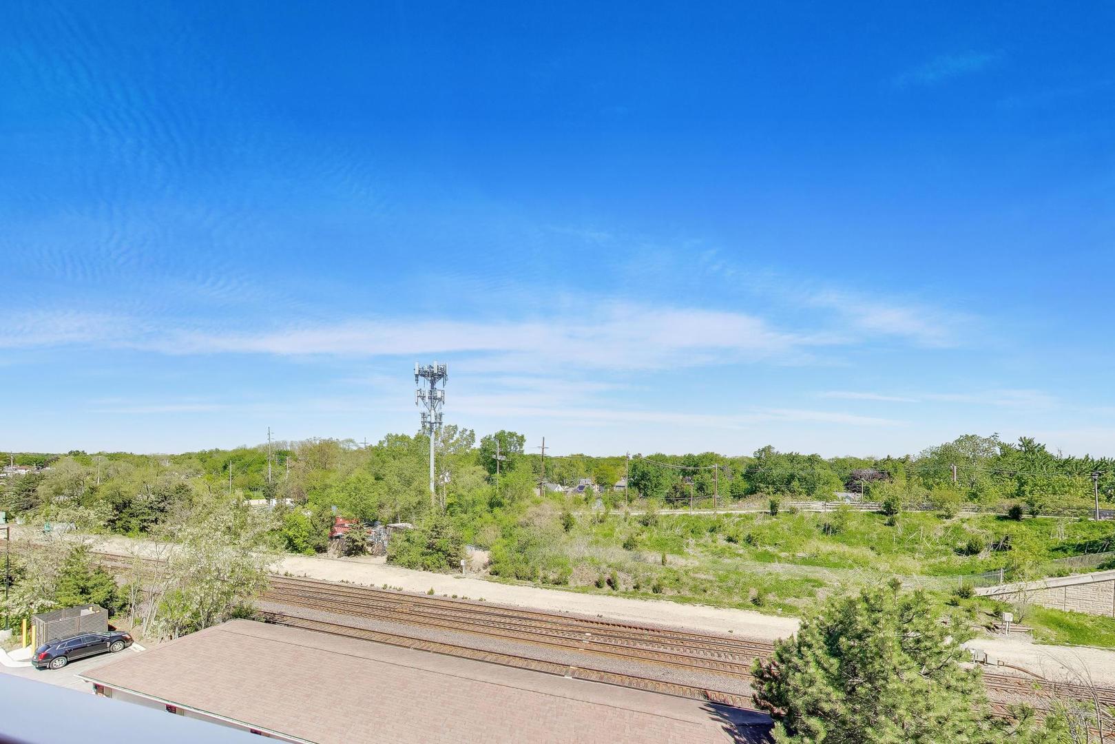 500 East St Charles Road, Unit 510 Lombard, IL 60148 - Photo 26 of 28 a view of a mountain from a window
