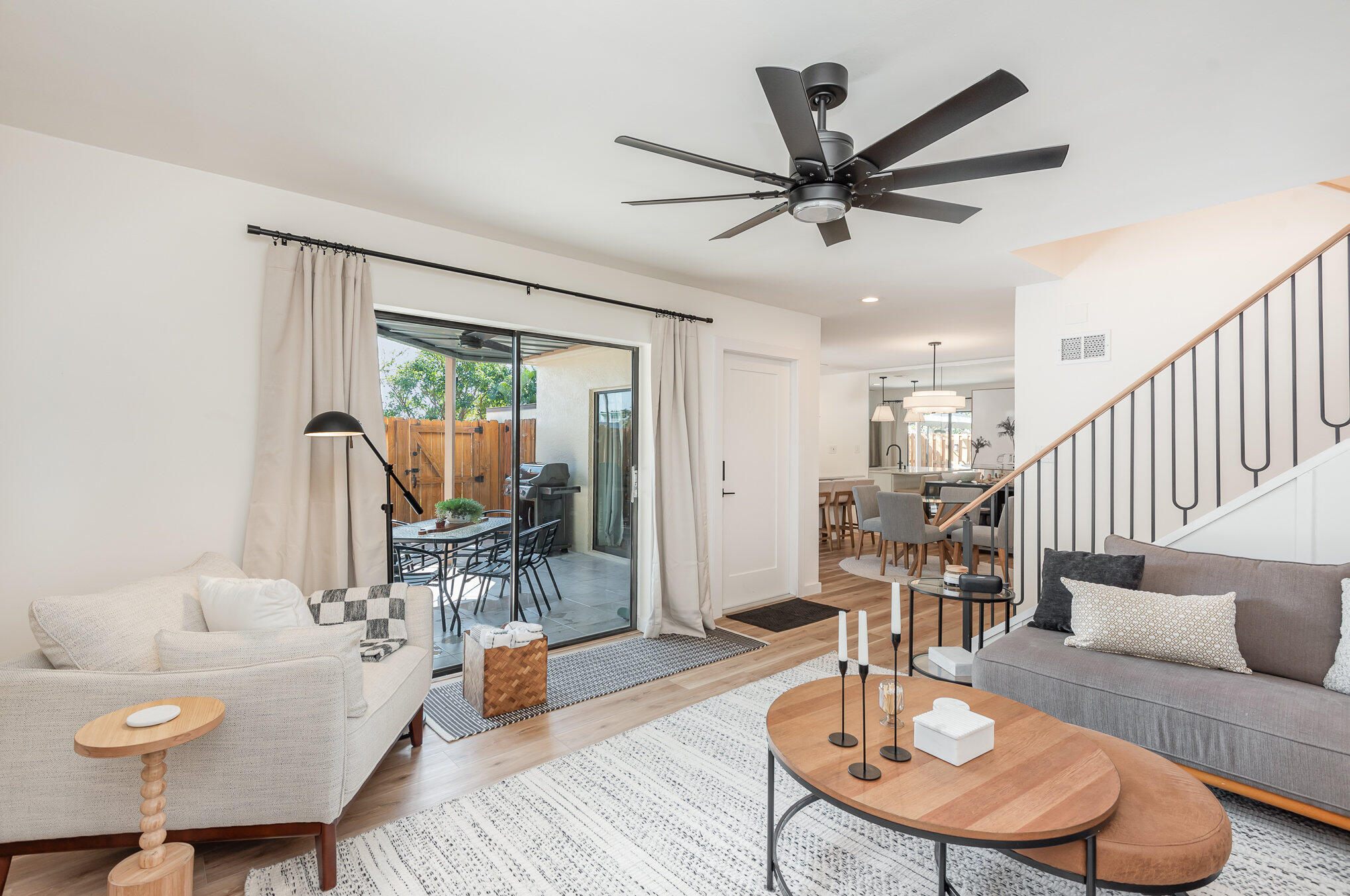 200 South Banana River Boulevard, Unit 804 Cocoa Beach, FL 32931 - Photo 2 of 31 a living room with furniture and a large window
