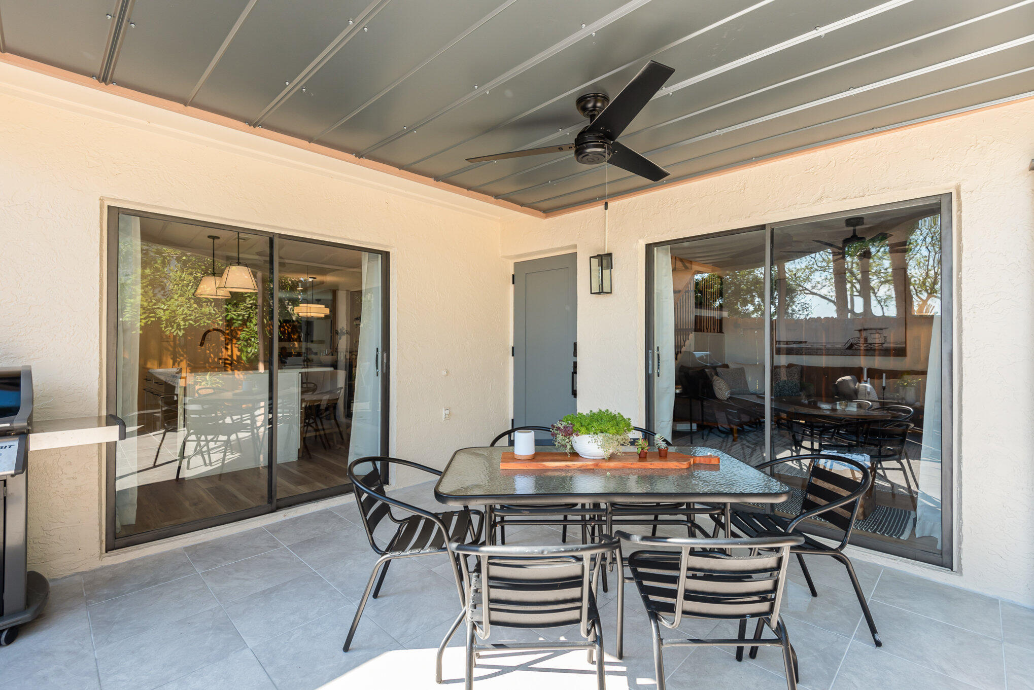 200 South Banana River Boulevard, Unit 804 Cocoa Beach, FL 32931 - Photo 21 of 31 a outdoor dining space with a table and chairs