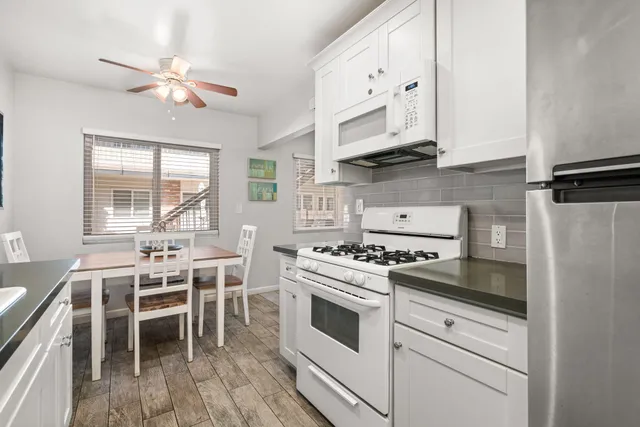 a view of a field with an ocean