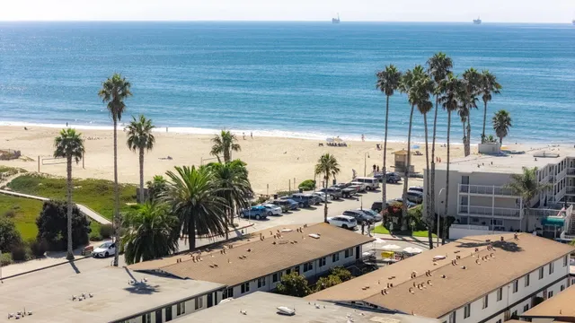 a view of a large building with an ocean