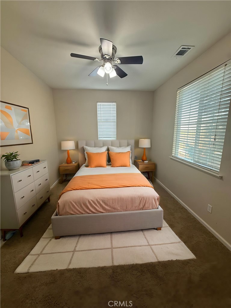 154 Montage Drive Merced, CA 95348 - Photo 14 of 18 a bedroom with a bed and window