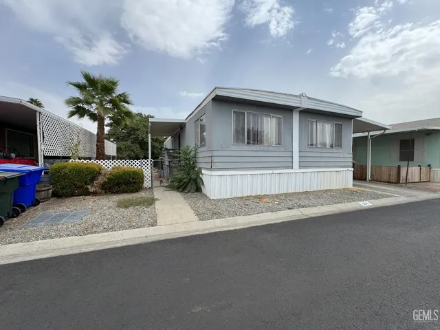 a house view with a backyard space