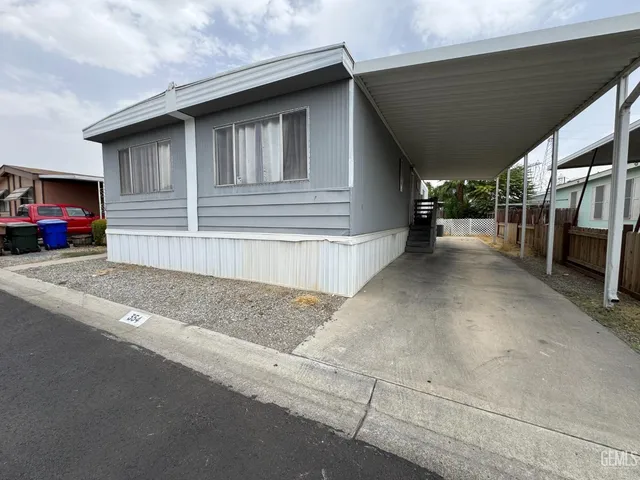 a view of a house with a patio