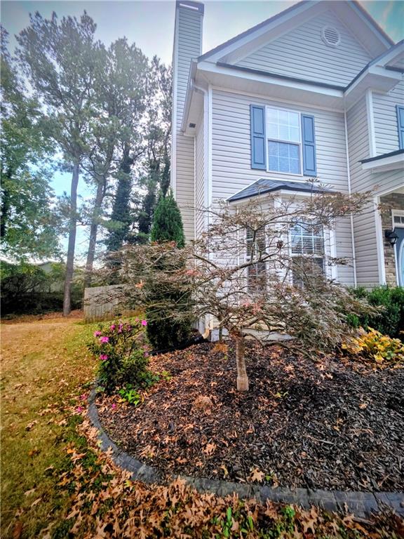 108 Riley Way Canton, GA 30115 - Photo 31 of 33 a view of a house with a yard