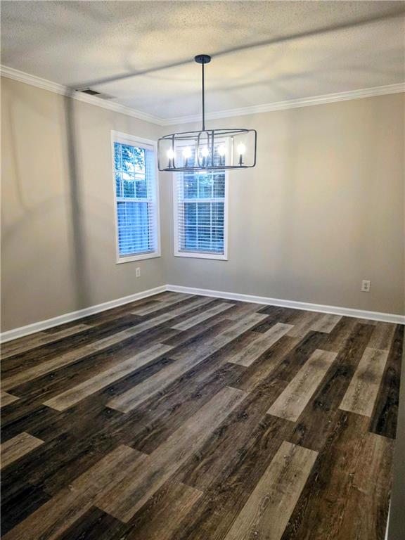 108 Riley Way Canton, GA 30115 - Photo 4 of 33 a view of a windows and chandelier in a room