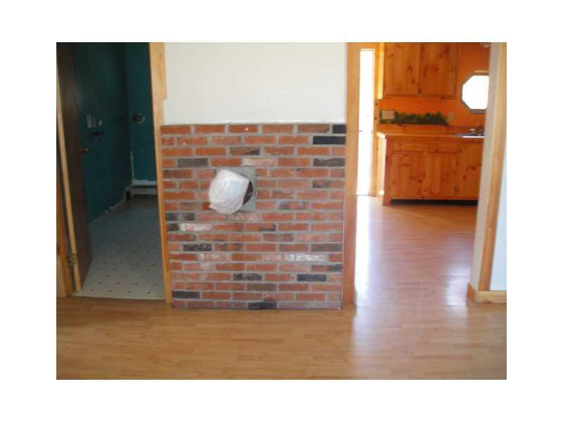 6 Moosehorn Road Abbot, ME 04406 - Photo 7 of 11 Living Room. WOOD STOVE HOOK UP