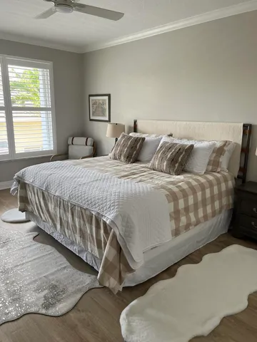 a bedroom with a bed and a couch