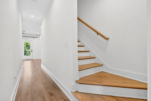 a view of entryway with wooden floor