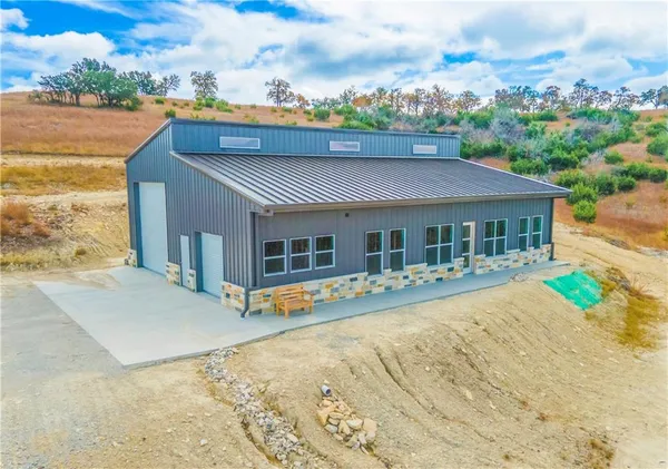 a view of house with outdoor space
