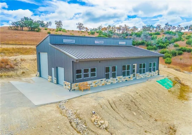 a view of house with outdoor space