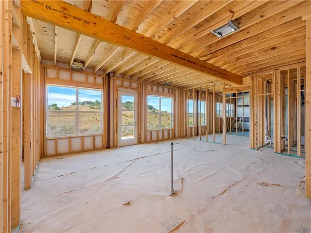 a view of entryway with wooden walls