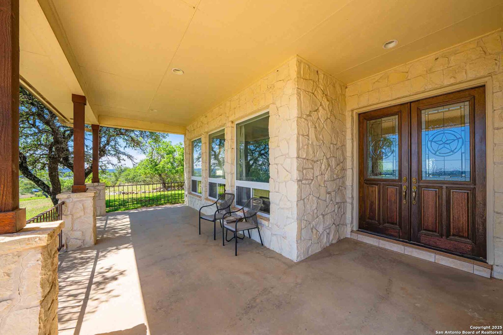 211 Mill Dam Road Comfort, TX 78013 - Photo 12 of 61 a view of a patio with a table and chairs