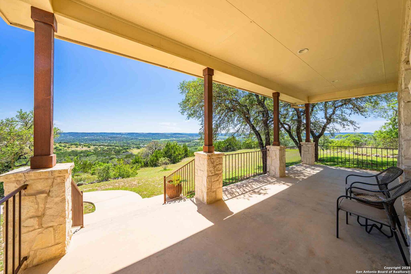 211 Mill Dam Road Comfort, TX 78013 - Photo 13 of 61 a view of a chairs and table in patio