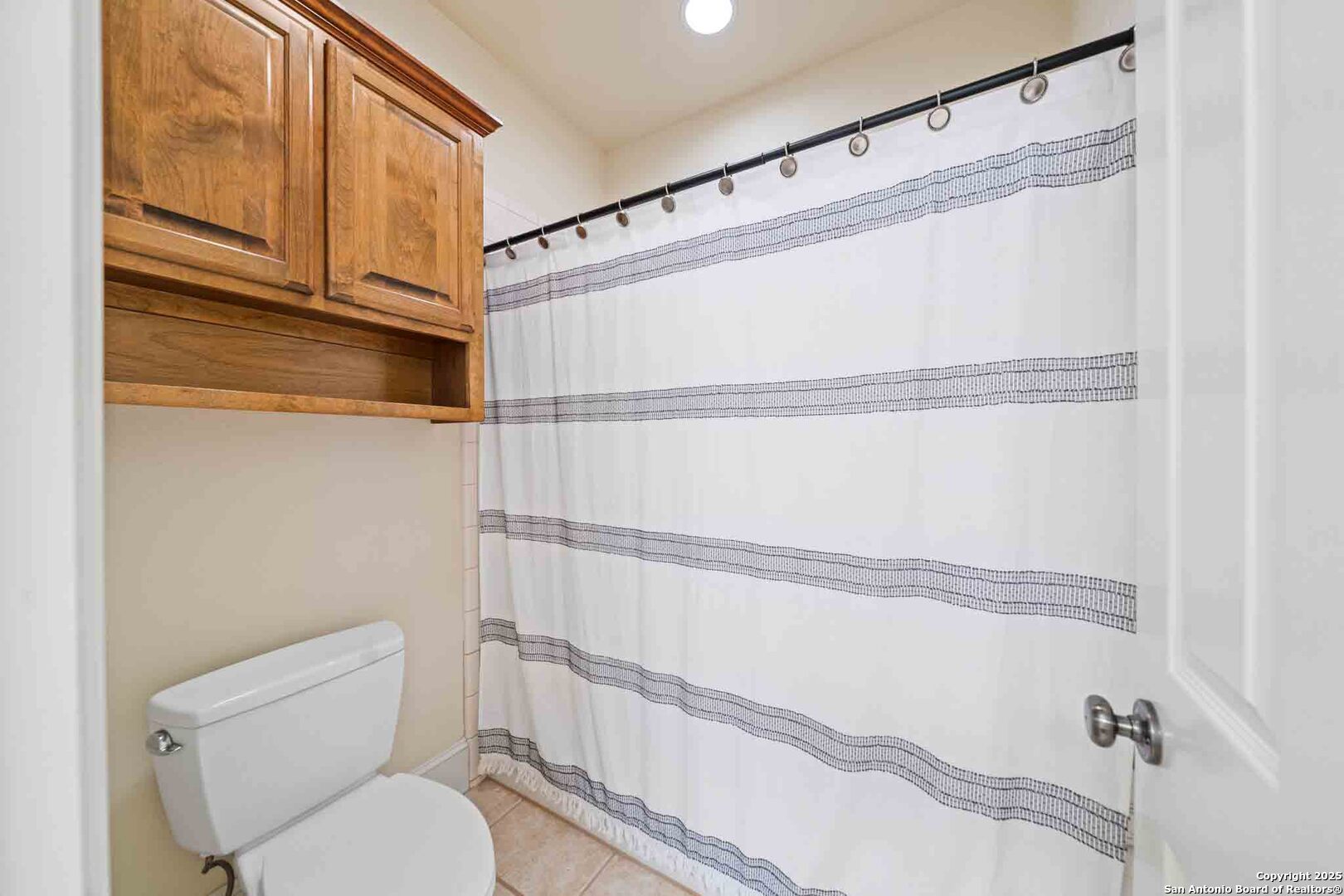 211 Mill Dam Road Comfort, TX 78013 - Photo 30 of 61 a bathroom with a toilet and a shower