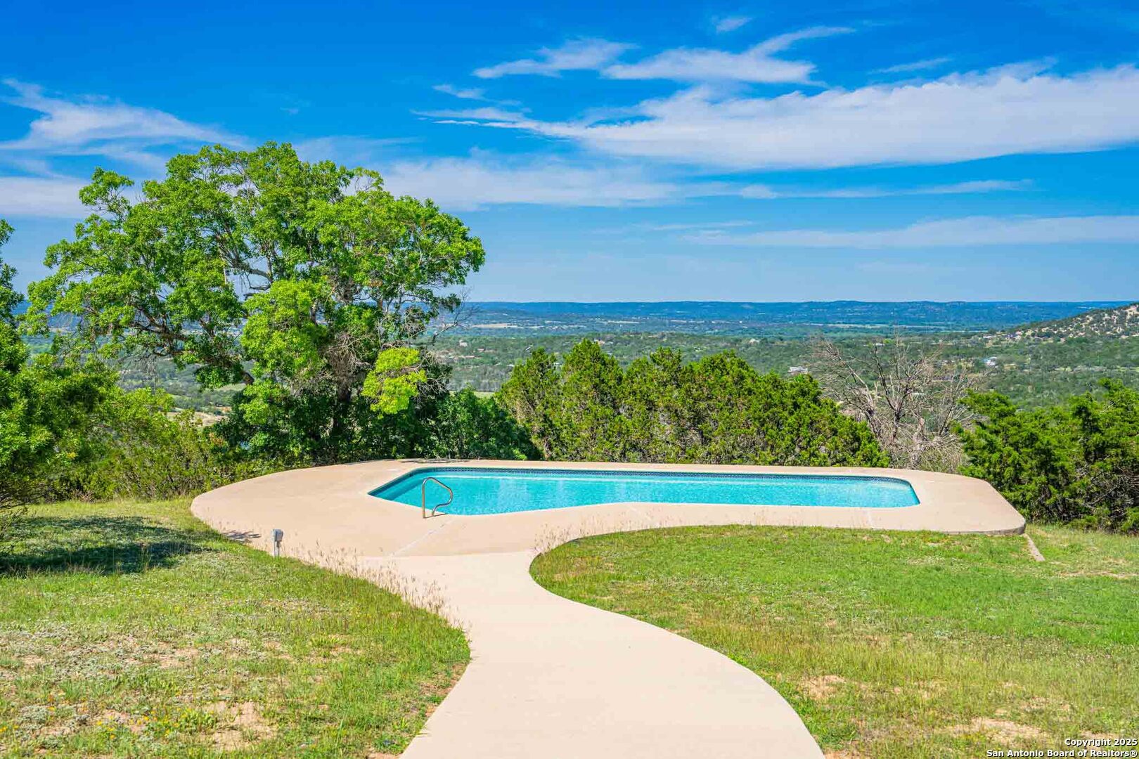 211 Mill Dam Road Comfort, TX 78013 - Photo 40 of 61 a view of outdoor space yard and swimming pool