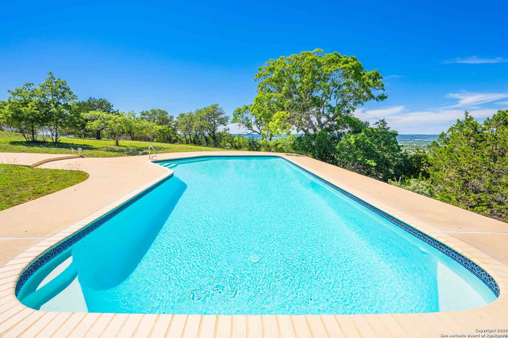 211 Mill Dam Road Comfort, TX 78013 - Photo 42 of 61 a view of an outdoor space and swimming pool