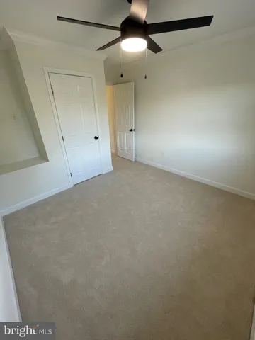 a bathroom with a sink vanity granite and a mirror