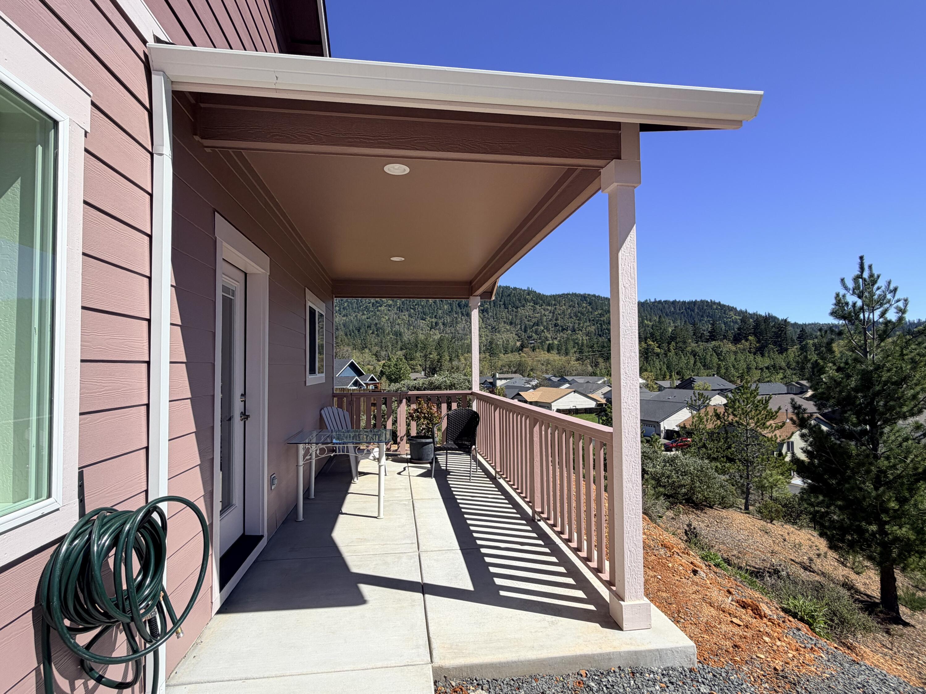 340 Cedar Ridge Drive Cave Junction, OR 97523 - Photo 28 of 37 Coverd porch area in the back