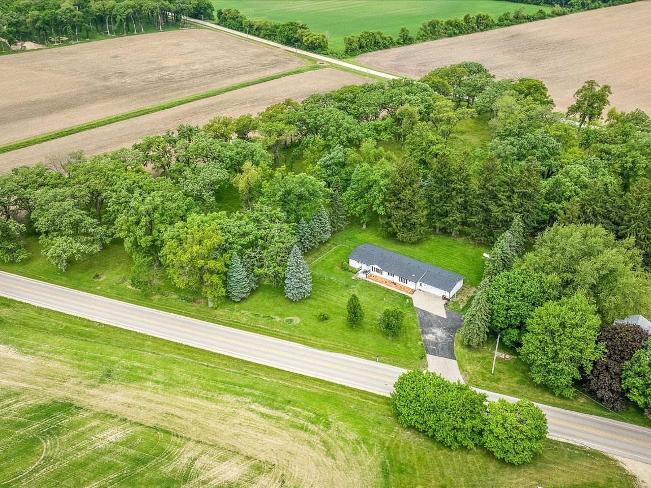 8500 Manchester Road Capron, IL 61012 - Photo 12 of 51 a view of a field with plants