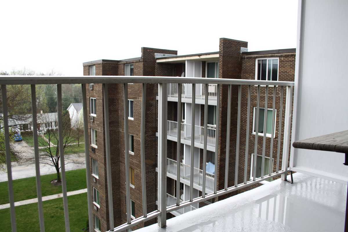 225 South Rohlwing Road, Unit 607 Palatine, IL 60074 - Photo 13 of 13 a view of a building from a balcony