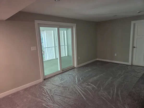 an empty room with windows