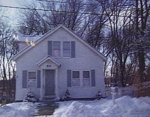54 Sylvester Street Springfield, MA 01109 - Photo 1 of 1 a front view of a house with garden