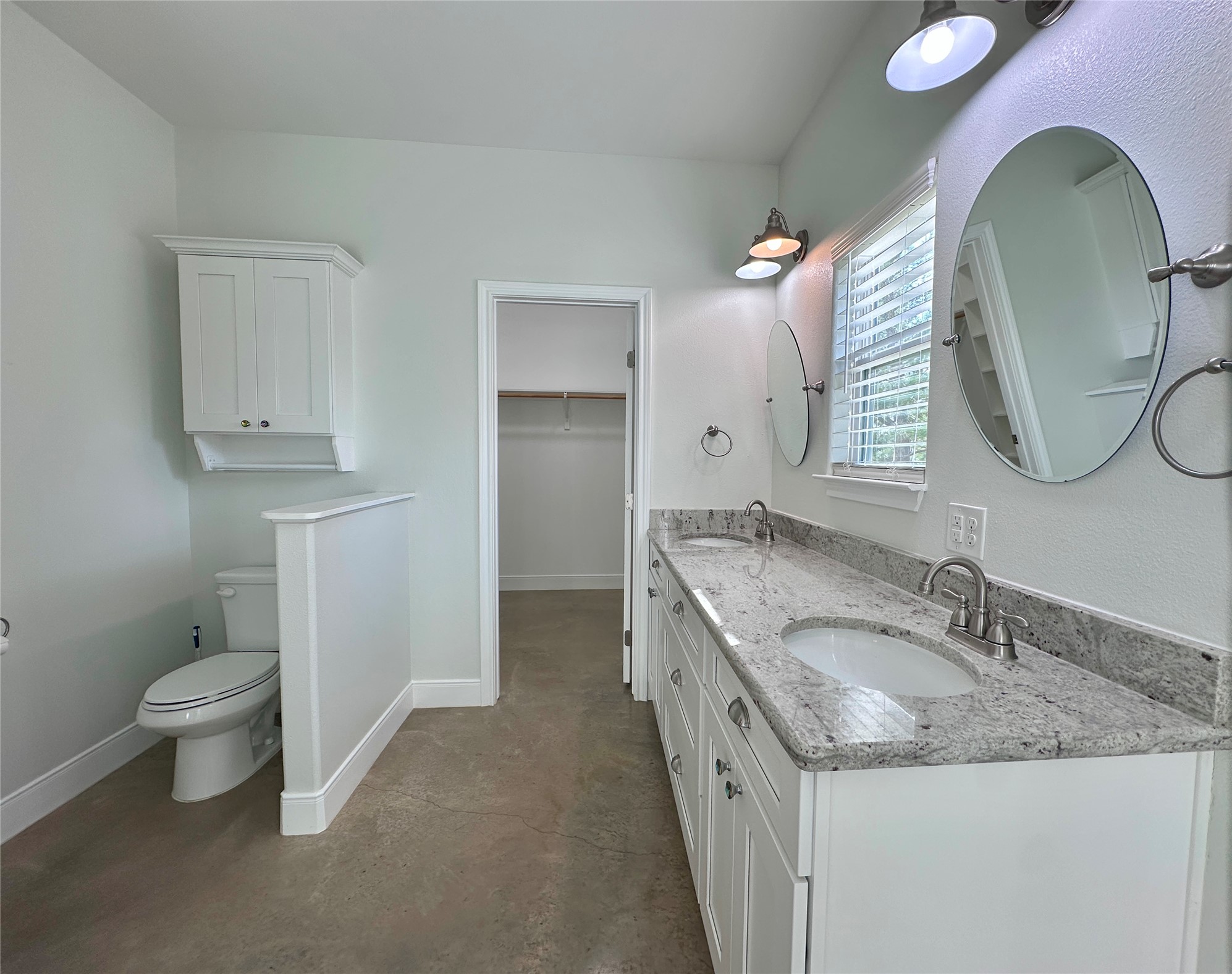 124 Pine Path Bastrop, TX 78602 - Photo 11 of 31 Primary Bathroom with toilet, and double sinks