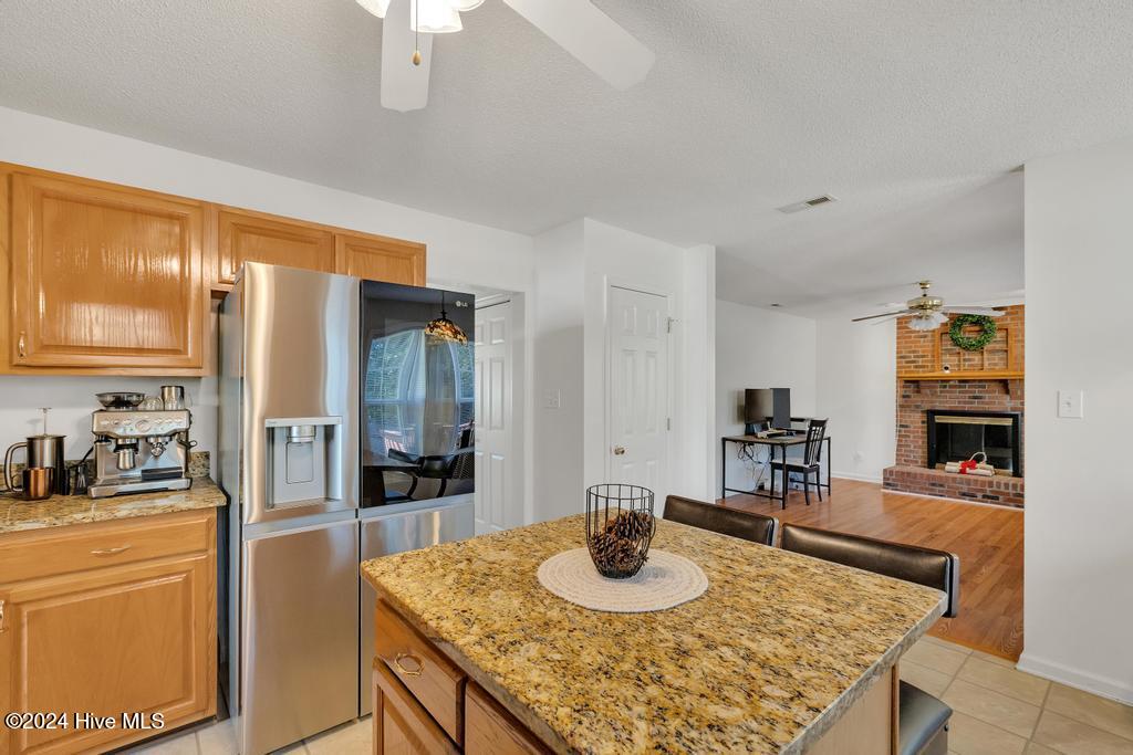 116 Raintree Circle Jacksonville, NC 28540 - Photo 13 of 34 Kitchen & Family Room
