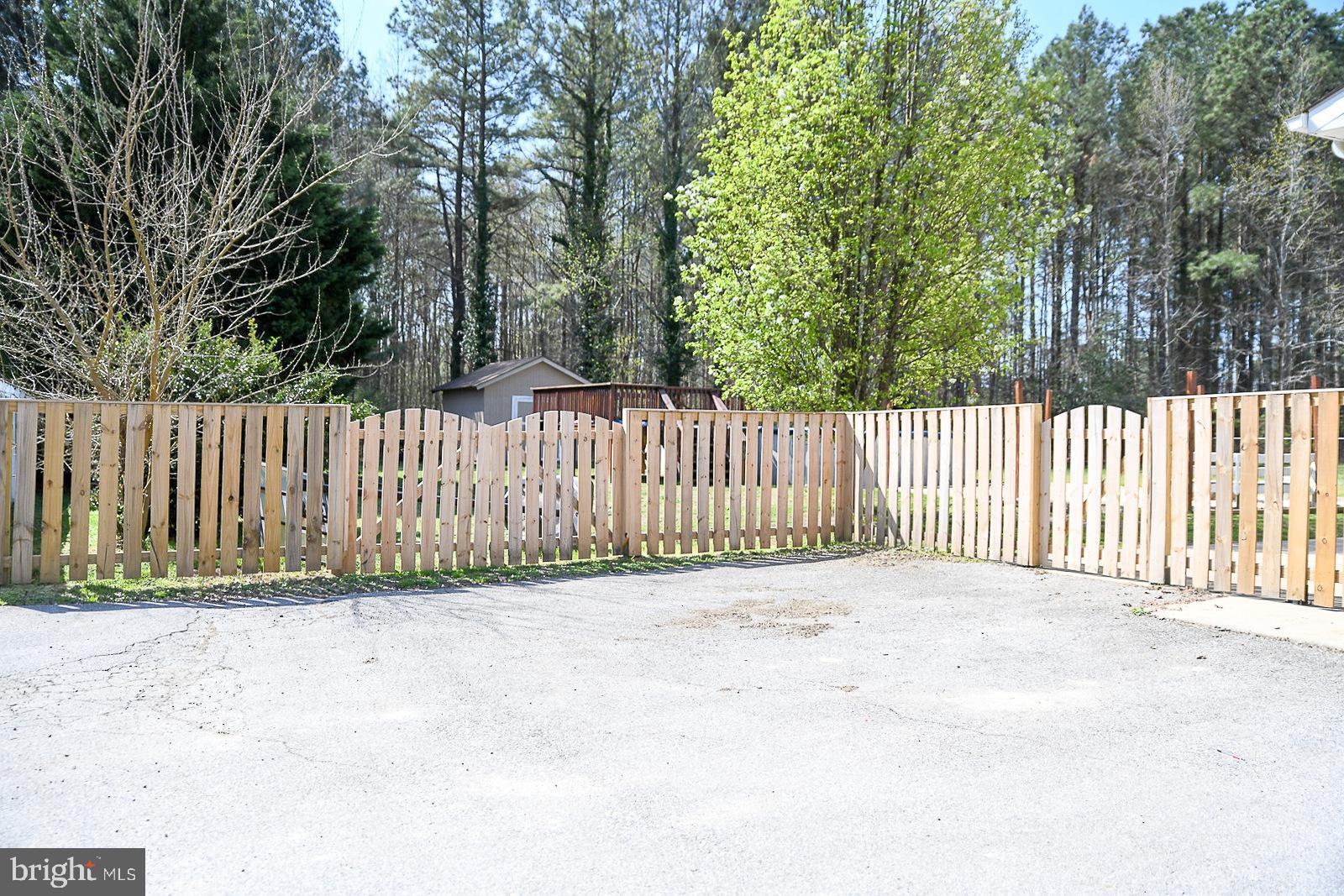 44015 Sandy Bottom Road Hollywood, MD 20636 - Photo 12 of 12 Paved area parking and fencing