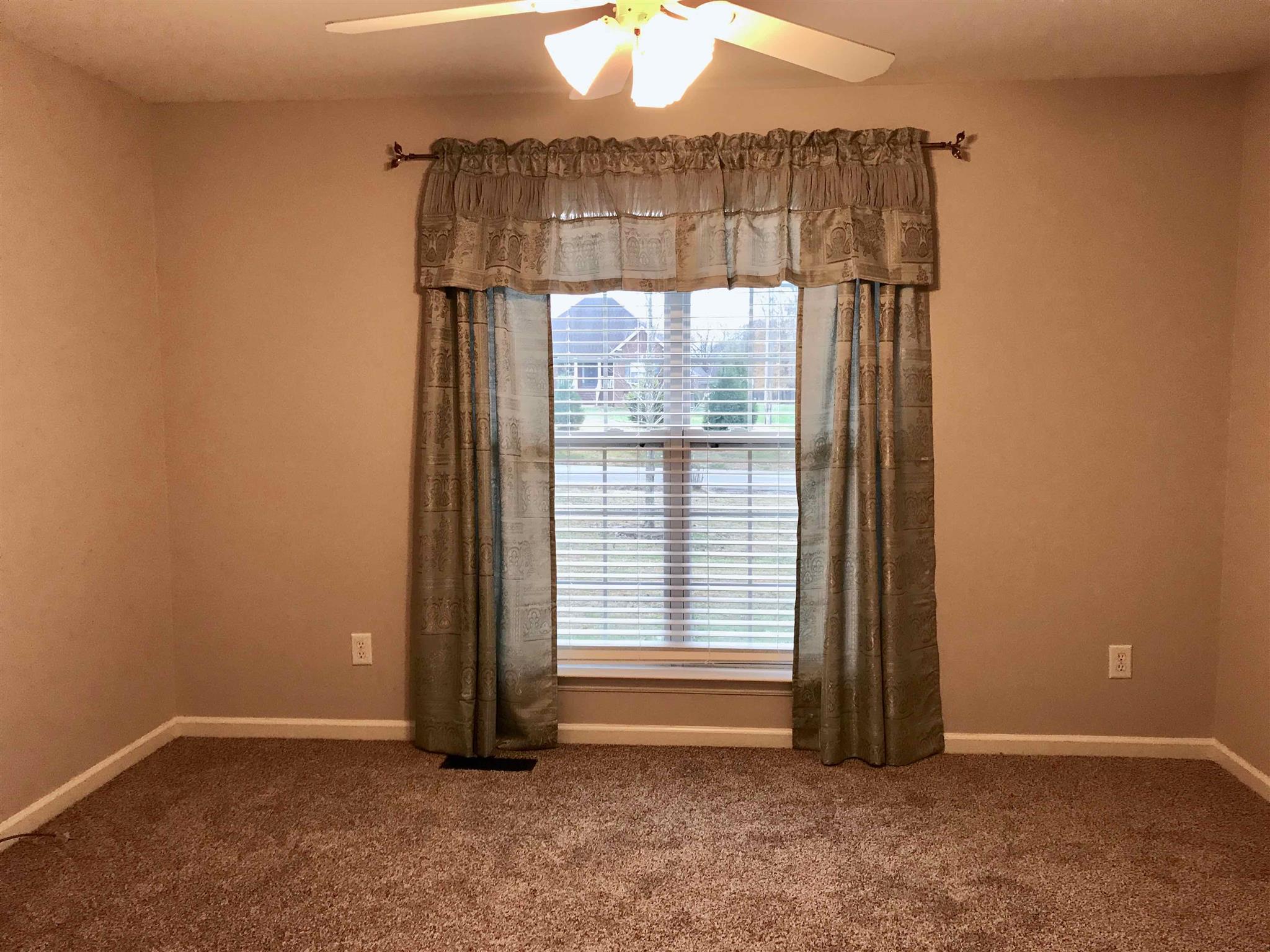 1955 Lasea Road Spring Hill, TN 37174 - Photo 14 of 21 an empty room with a window