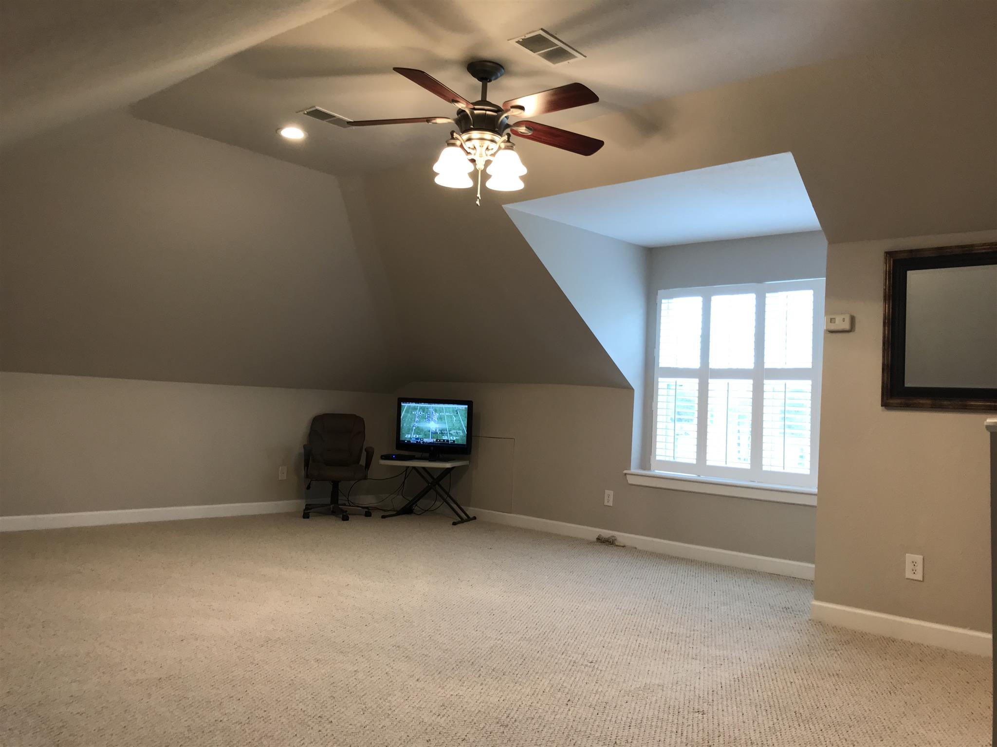 1955 Lasea Road Spring Hill, TN 37174 - Photo 9 of 21 a view of a livingroom with a ceiling fan and window