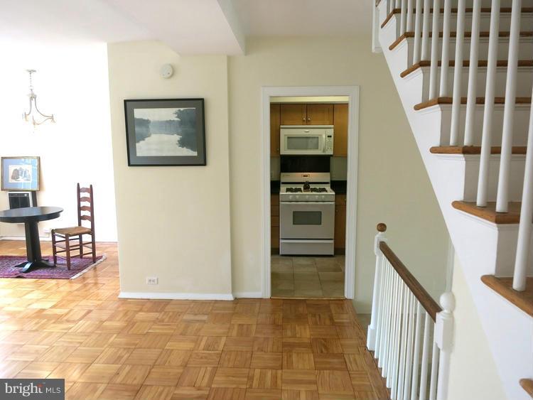 1619 Preston Road Alexandria, VA 22302 - Photo 4 of 13 a view of a hallway with furniture and entryway