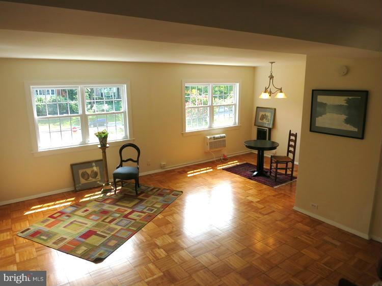 1619 Preston Road Alexandria, VA 22302 - Photo 6 of 13 a workspace with furniture and a window