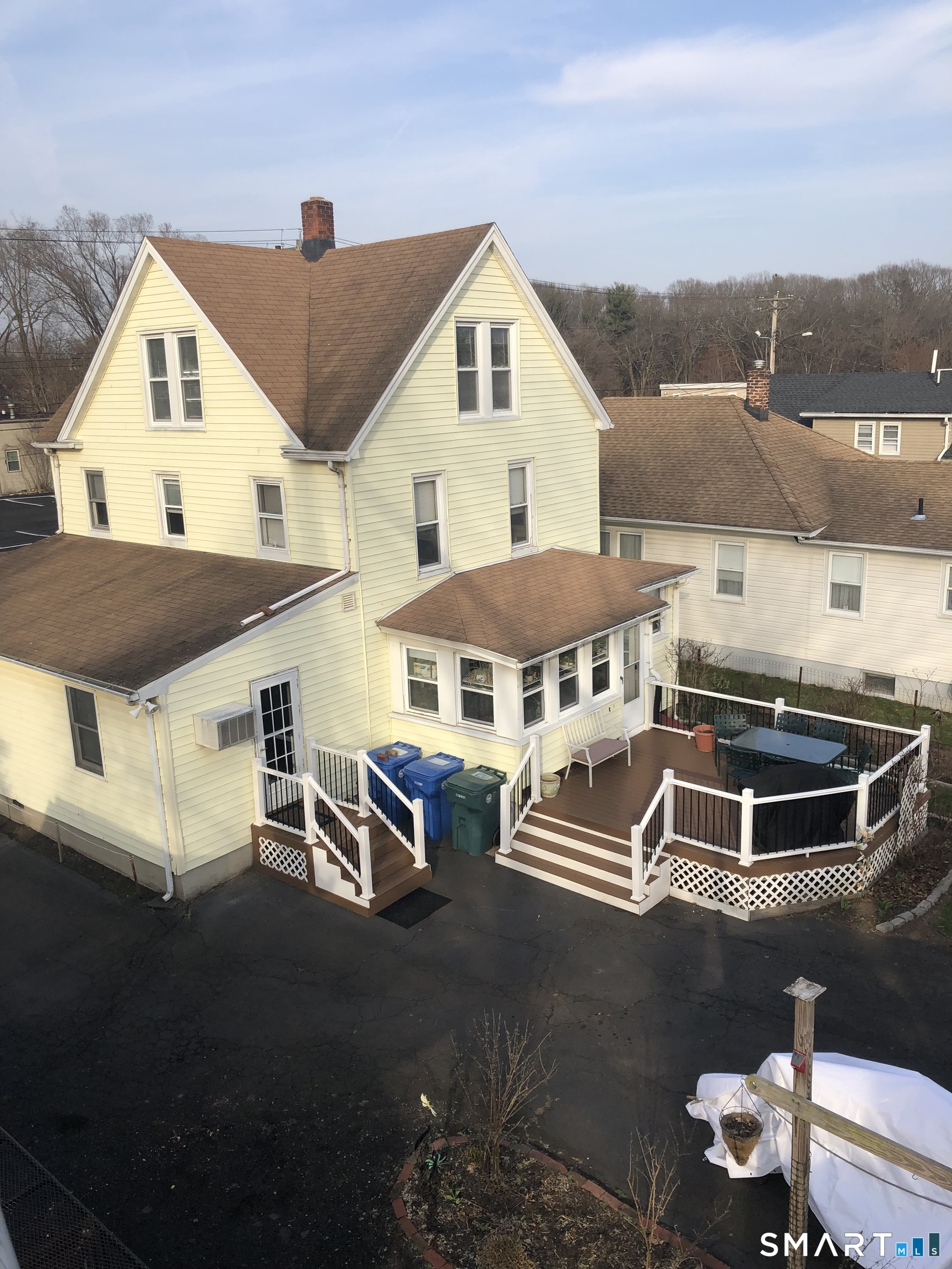 a aerial view of a house with a yard