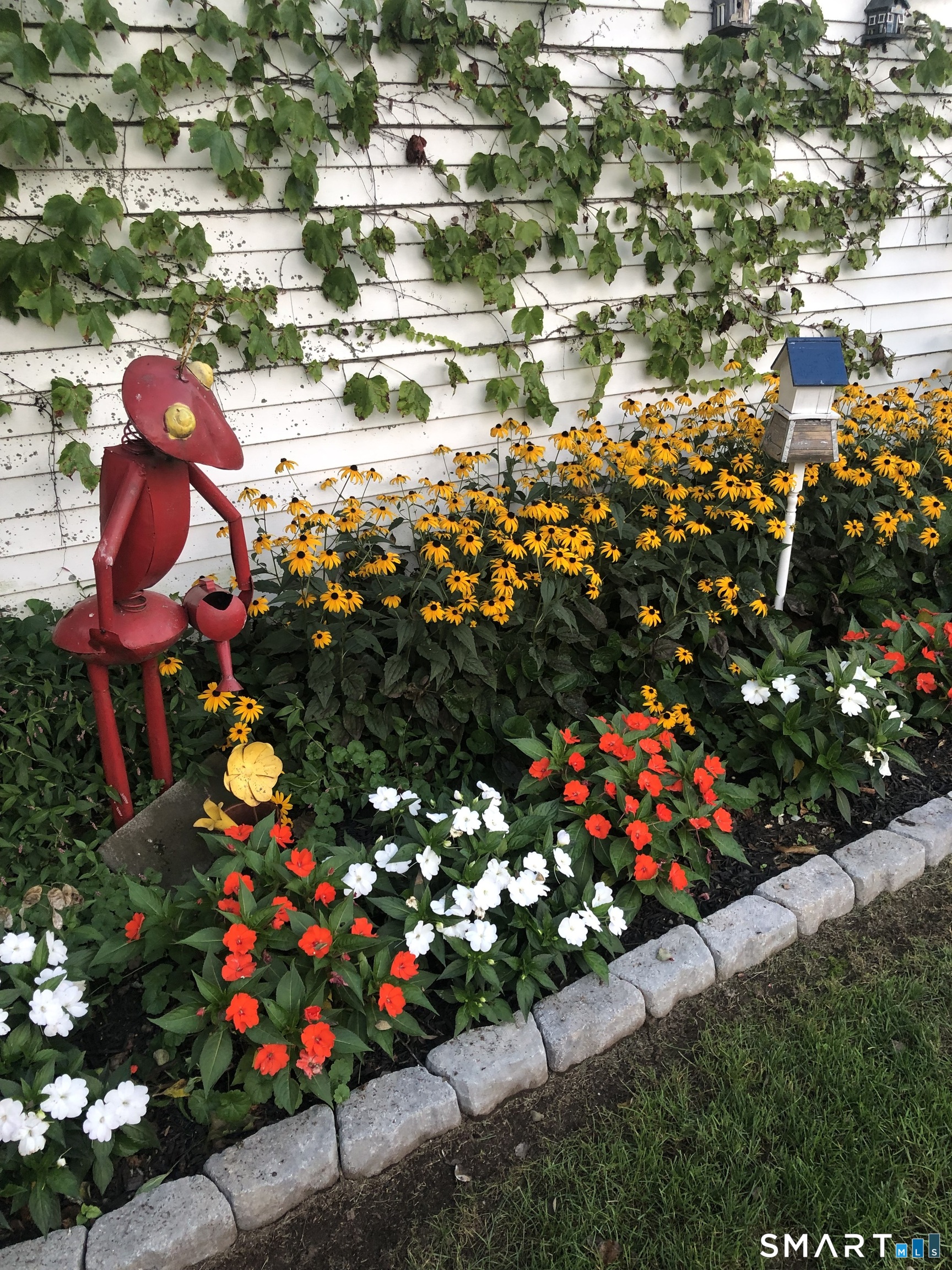 15 Oregon Avenue Hamden, CT 06514 - Photo 13 of 16 a bunch of flowers are in a lot of flowers