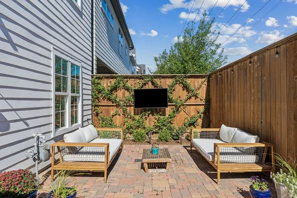a backyard of a house with seating space