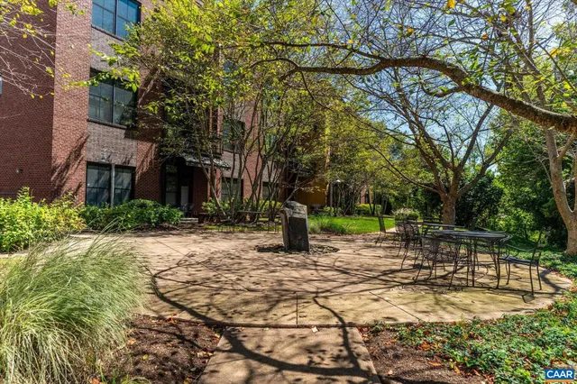 a view of outdoor space with deck and yard