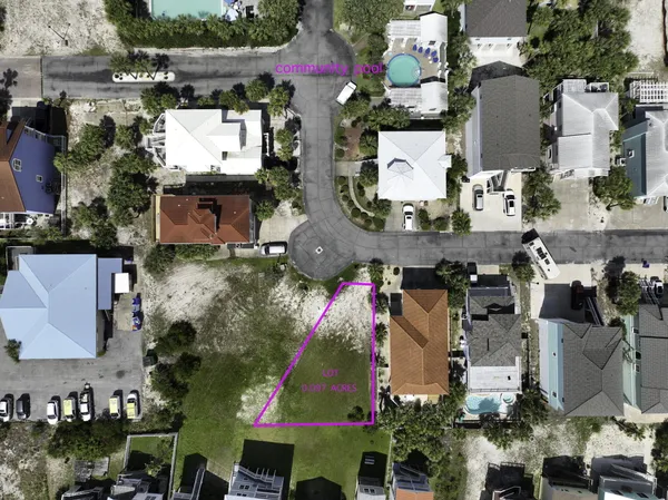an aerial view of houses with outdoor space