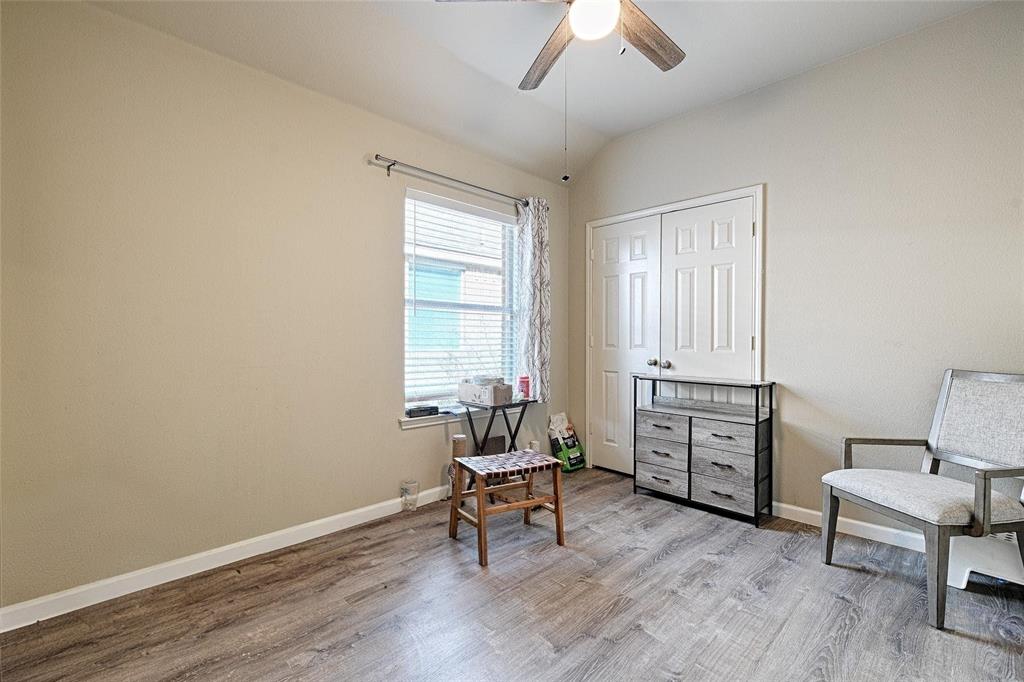 2704 Spring Drive McKinney, TX 75072 - Photo 24 of 35 a living room with furniture and a window