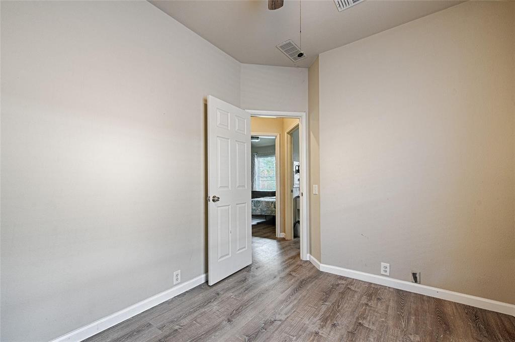 2704 Spring Drive McKinney, TX 75072 - Photo 25 of 35 wooden floor in an empty room
