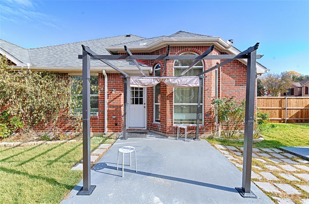 2704 Spring Drive McKinney, TX 75072 - Photo 32 of 35 a view of a house with backyard and porch