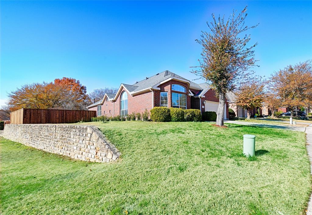 2704 Spring Drive McKinney, TX 75072 - Photo 35 of 35 a front view of a house with a yard