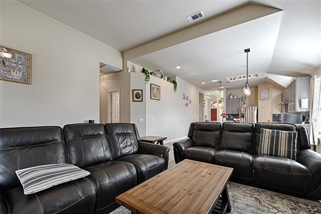 2704 Spring Drive McKinney, TX 75072 - Photo 5 of 35 a living room with furniture