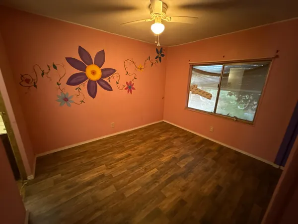 view of an empty room with a window