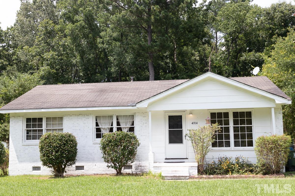 4914 Brentwood Road Durham, NC 27713 - Photo 1 of 11 a front view of house with yard porch and green space