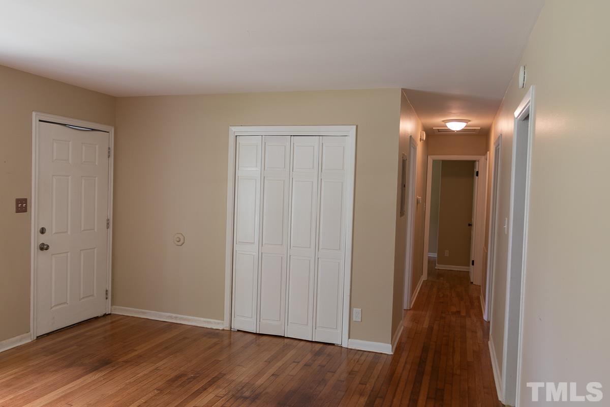 4914 Brentwood Road Durham, NC 27713 - Photo 3 of 11 a view of a livingroom with wooden floor