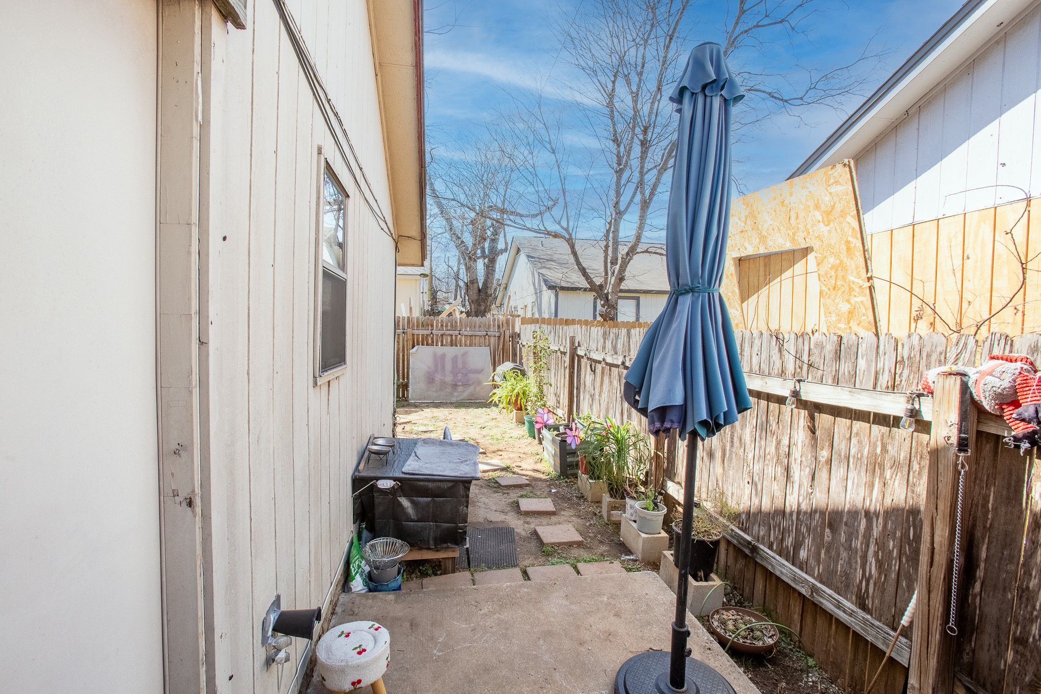 606 Misty Morning Way, Unit A AND B Round Rock, TX 78664 - Photo 21 of 22 Fenced backyard with a patio